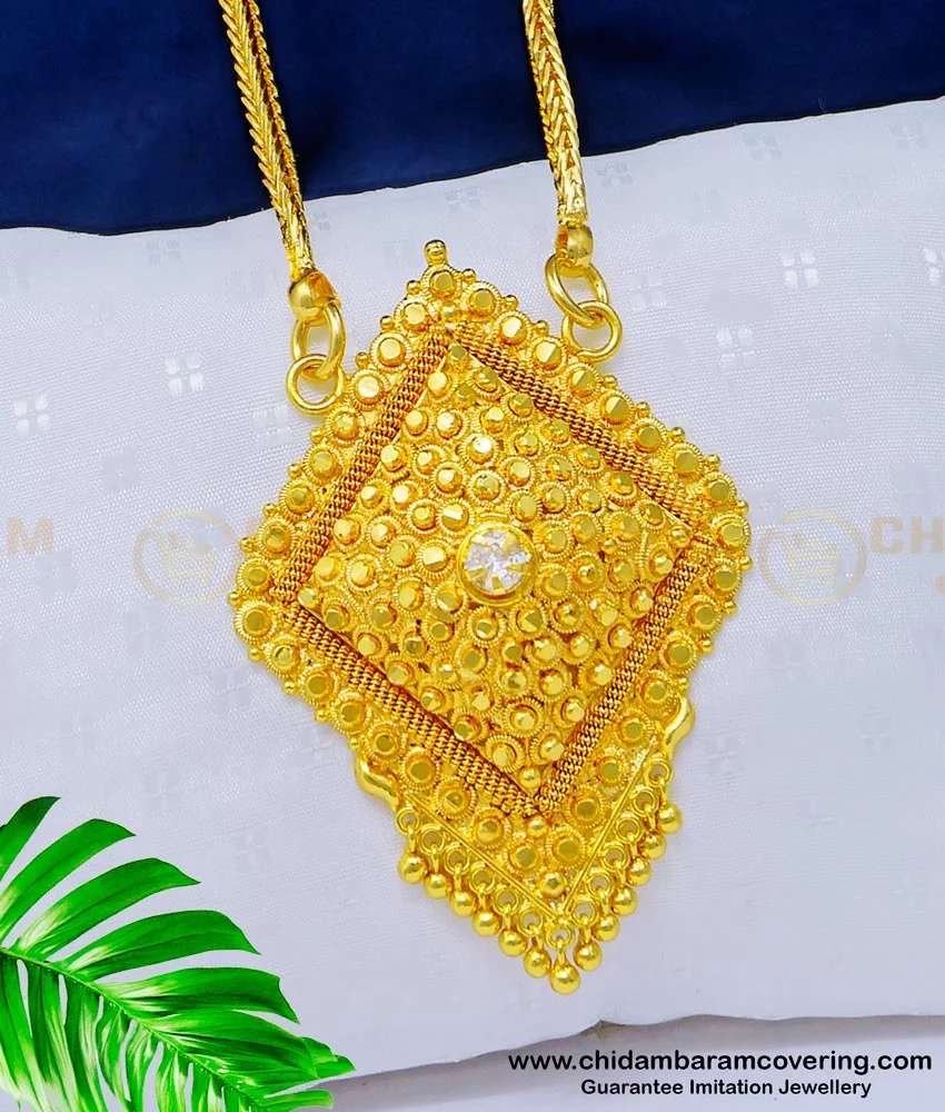 Gold designer store locket